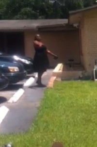 awhc-woman-throws-rock-large